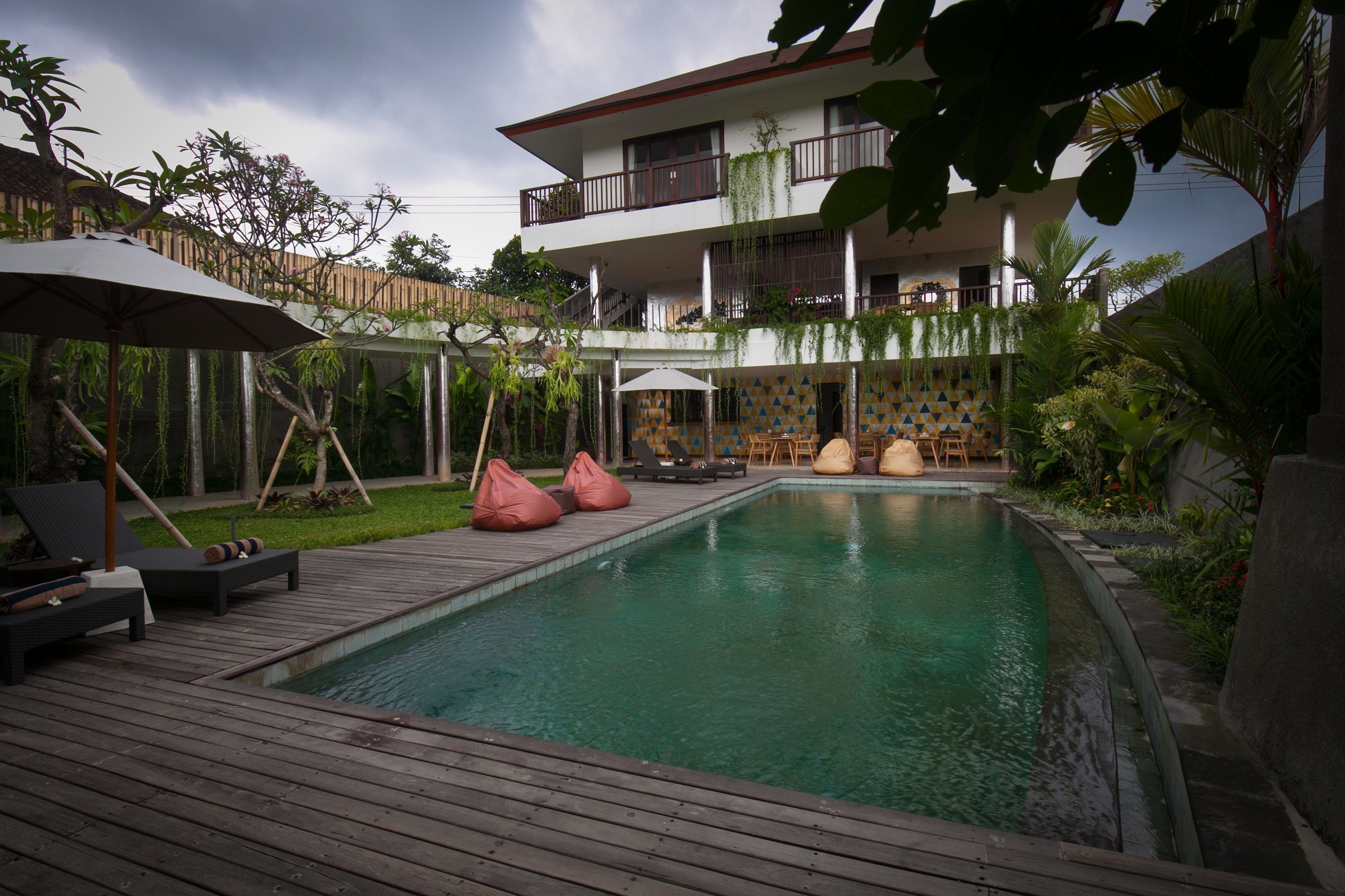 outdoor pool, pool umbrellas, pool loungers