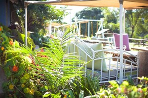 Breakfast, lunch, dinner served; local and international cuisine 