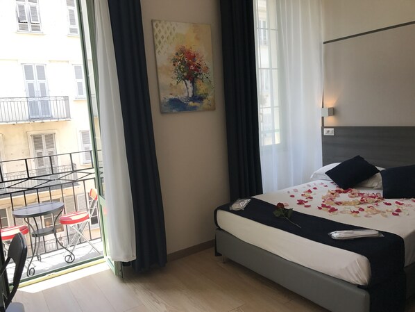Double room with balcony, pedestrian  street view
