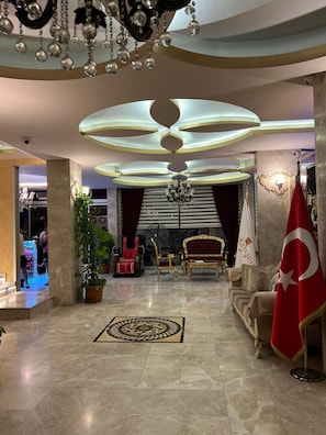 Suite | Living area | 82-inch LCD TV with satellite channels, TV, iPod dock - Grand Ezel Hotel (Mersin)