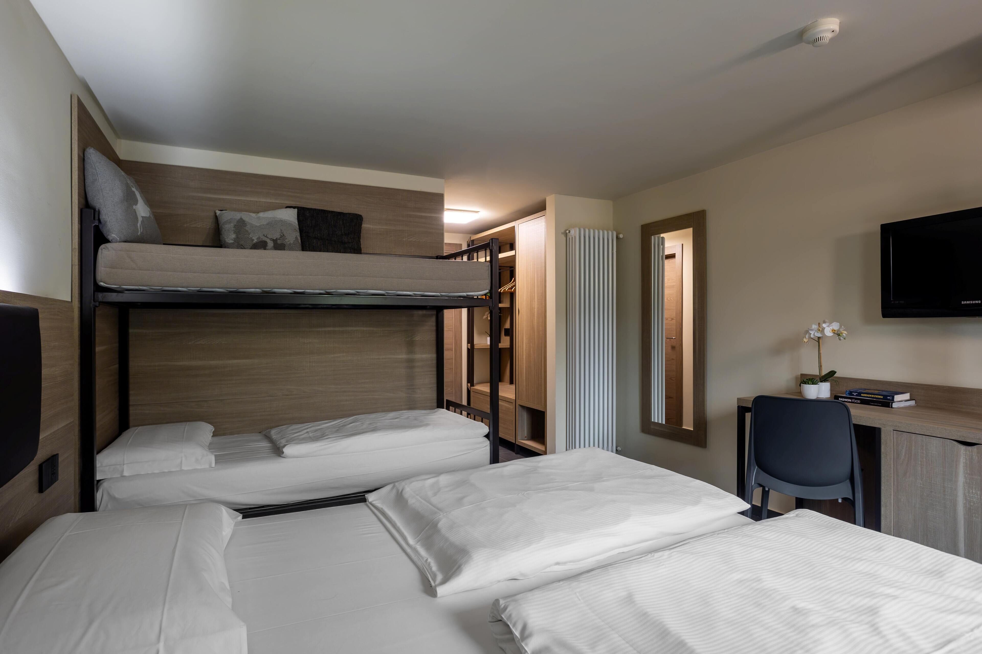 comfort triple room | in-room safe, desk, blackout curtains, soundproofing