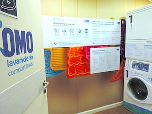 Convenient laundry facilities offer a shared washing machine and clear instructions for use.