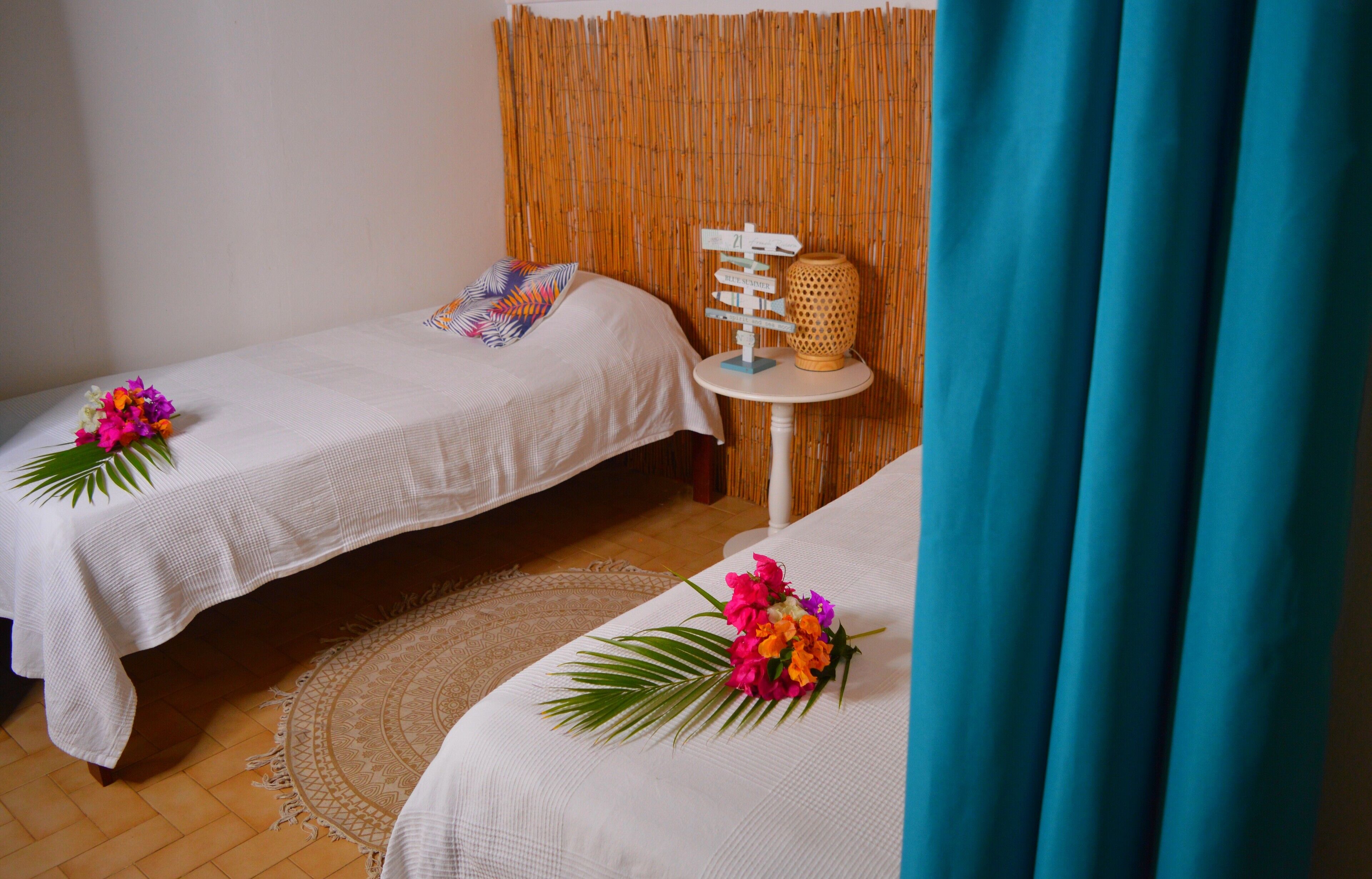 family bungalow, multiple beds, sea view | living area | 50-cm tv with digital channels