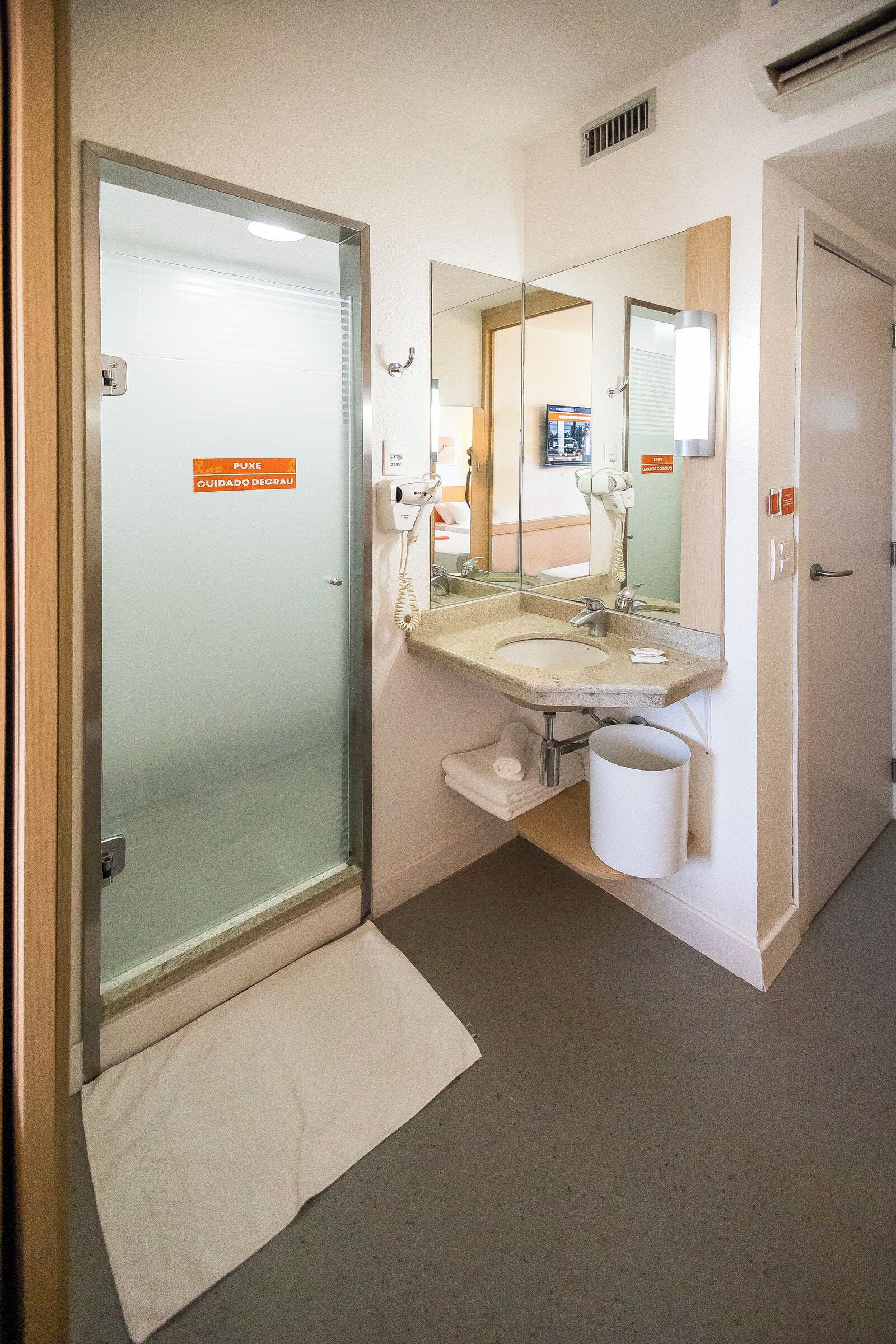 shower, eco-friendly toiletries, hair dryer, towels