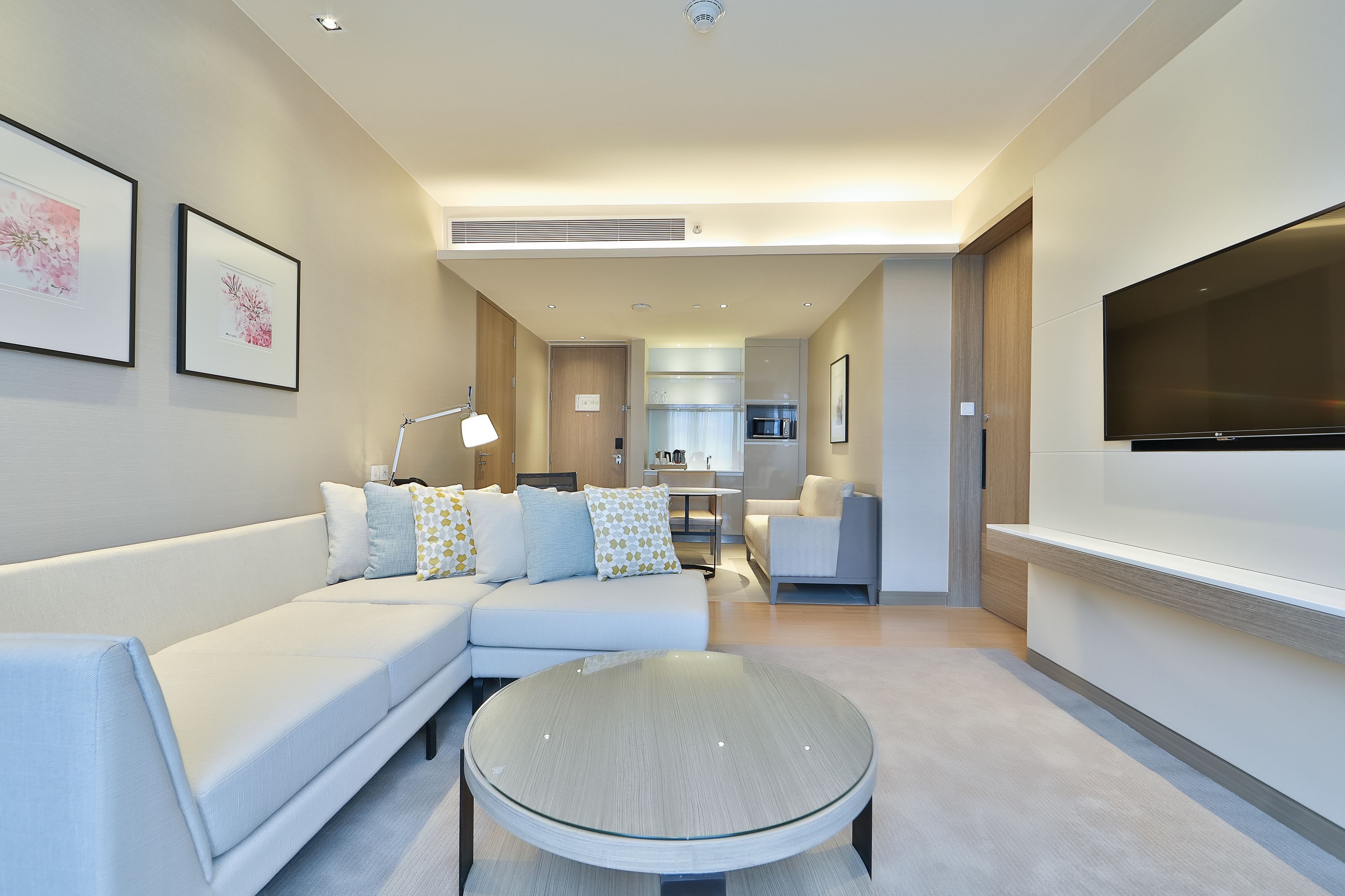 suite, 2 bedrooms | living area | tv, heated floors