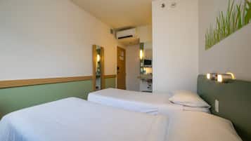 Standard Room, 2 Twin Beds | Individually decorated, desk, laptop workspace, blackout drapes