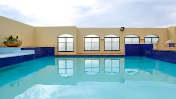 Outdoor pool, open 8:00 AM to 6:00 PM, sun loungers