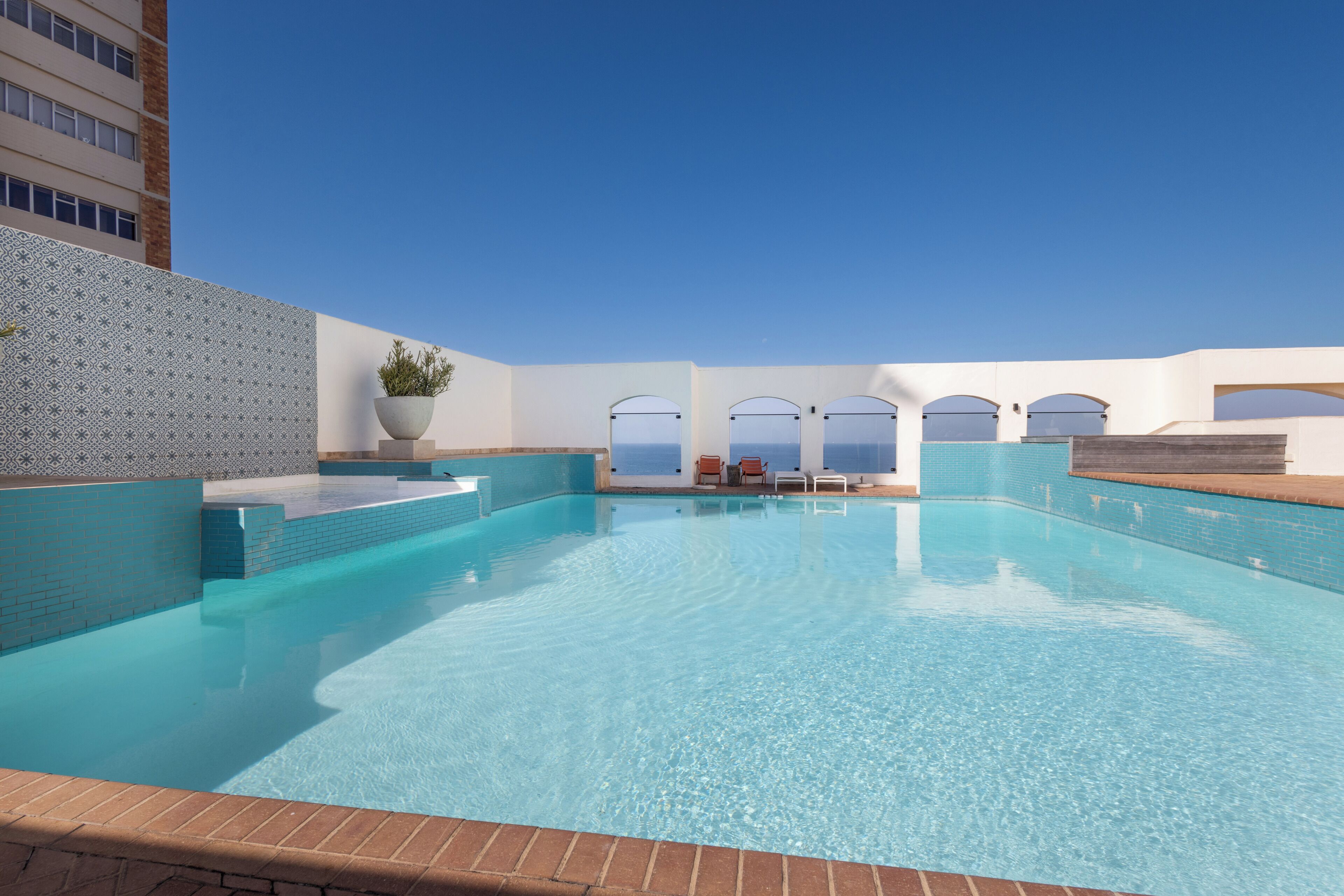 Outdoor pool, open 8:00 AM to 6:00 PM, pool loungers