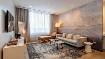 Deluxe Suite, 1 King Bed | Living room