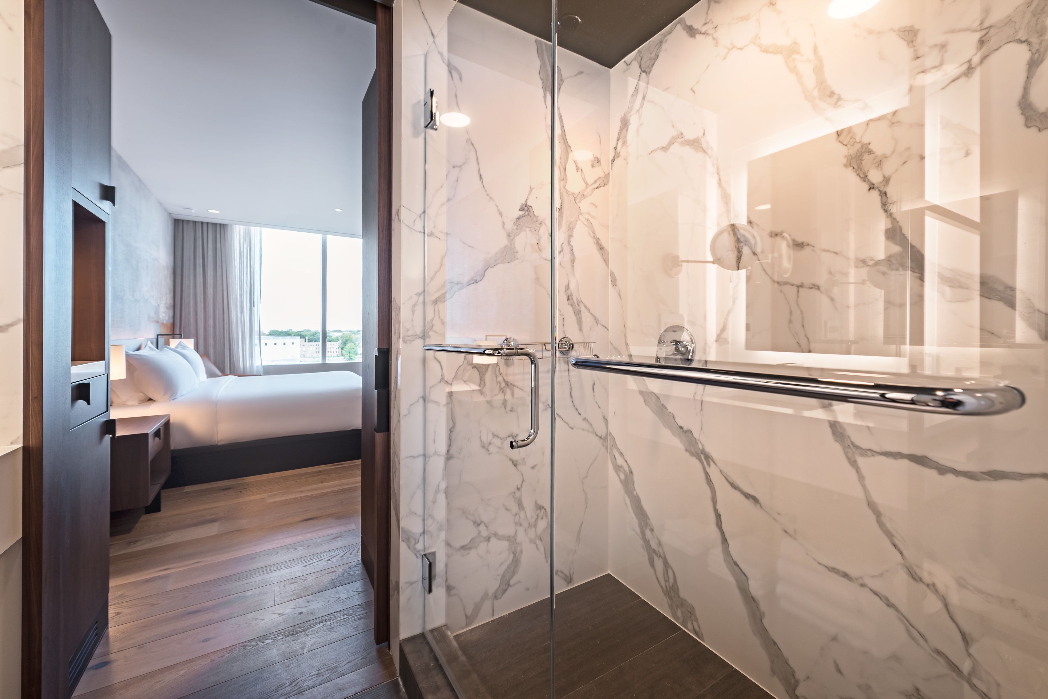 rainfall showerhead, designer toiletries, hair dryer, bathrobes