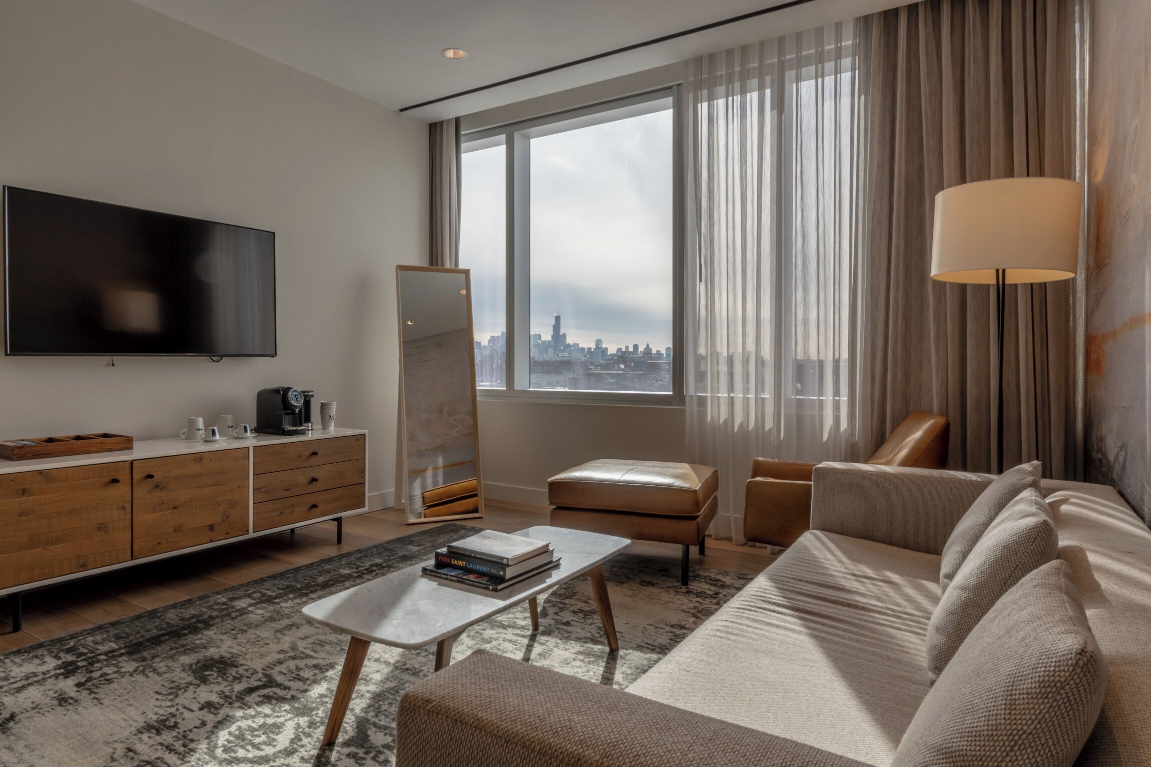 deluxe suite, 1 king bed | living room | 55-inch led tv with satellite channels, tv