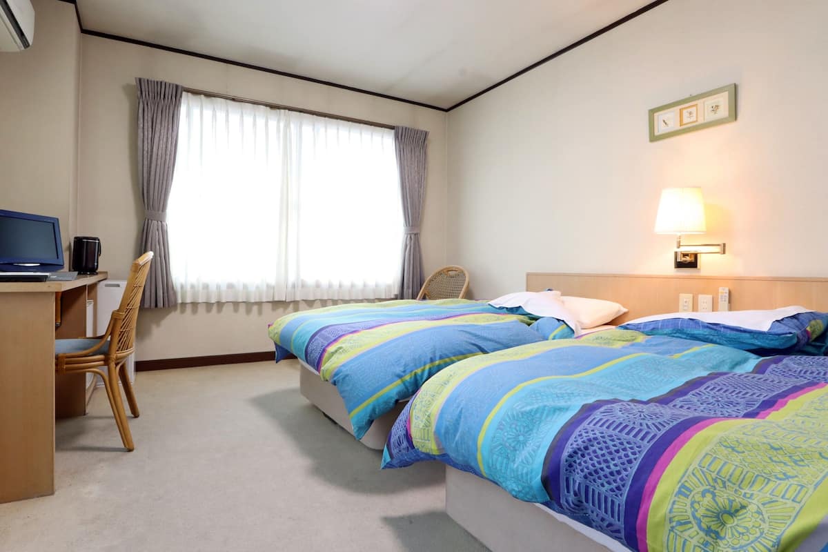 Standard Twin Room, 2 Twin Beds | In-room safe, free WiFi, bed sheets