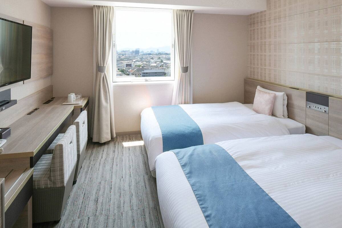 Desk, blackout drapes, iron/ironing board (on request), WiFi (free)