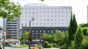 A modern building with a sign reading "VESSEL INN". - Vessel Inn Shiga Moriyama Station (Moriyama)