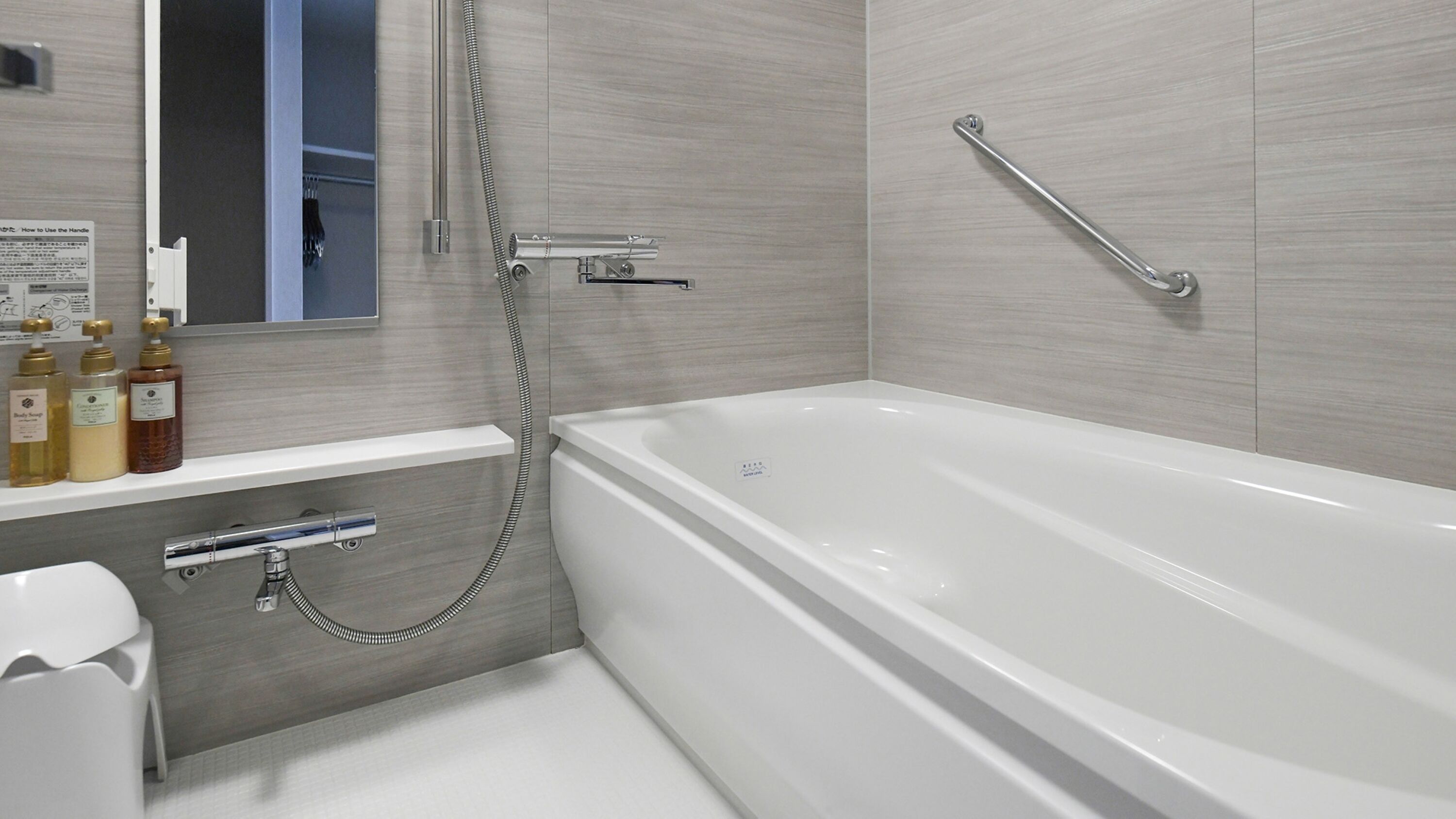 combined shower/bathtub, free toiletries, hair dryer, slippers