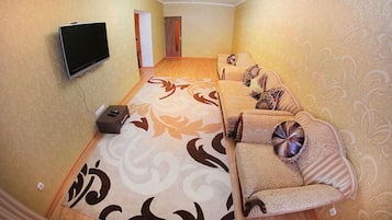 Apartment, 1 Bedroom, 2 Bathrooms (Rozibakieva 289/1, 79-09035) | Living area | Flat-screen TV