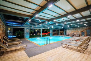 Indoor pool, 2 outdoor pools, open 9:00 AM to 7:00 PM, pool umbrellas