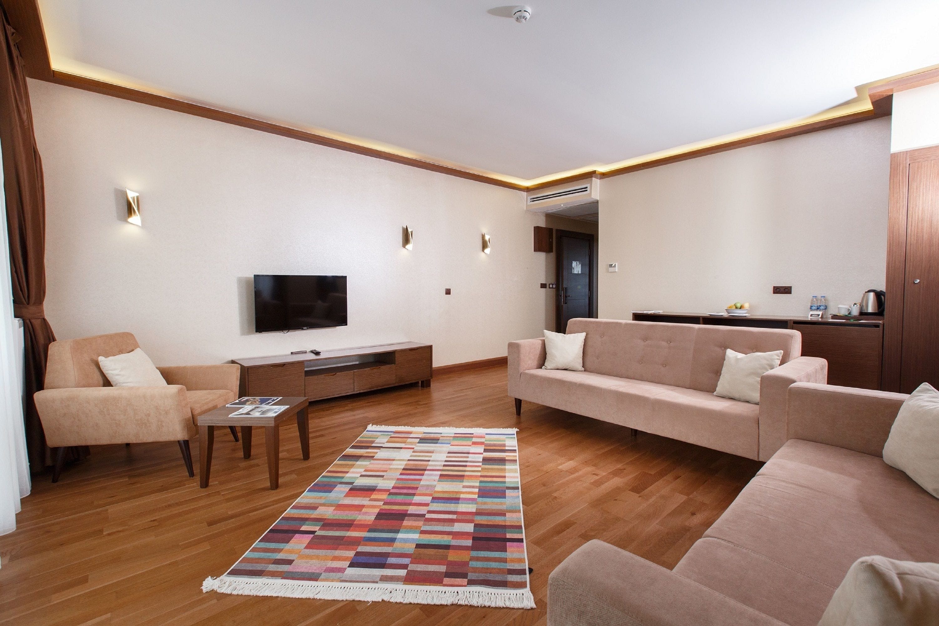 family junior suite | living area | lcd tv