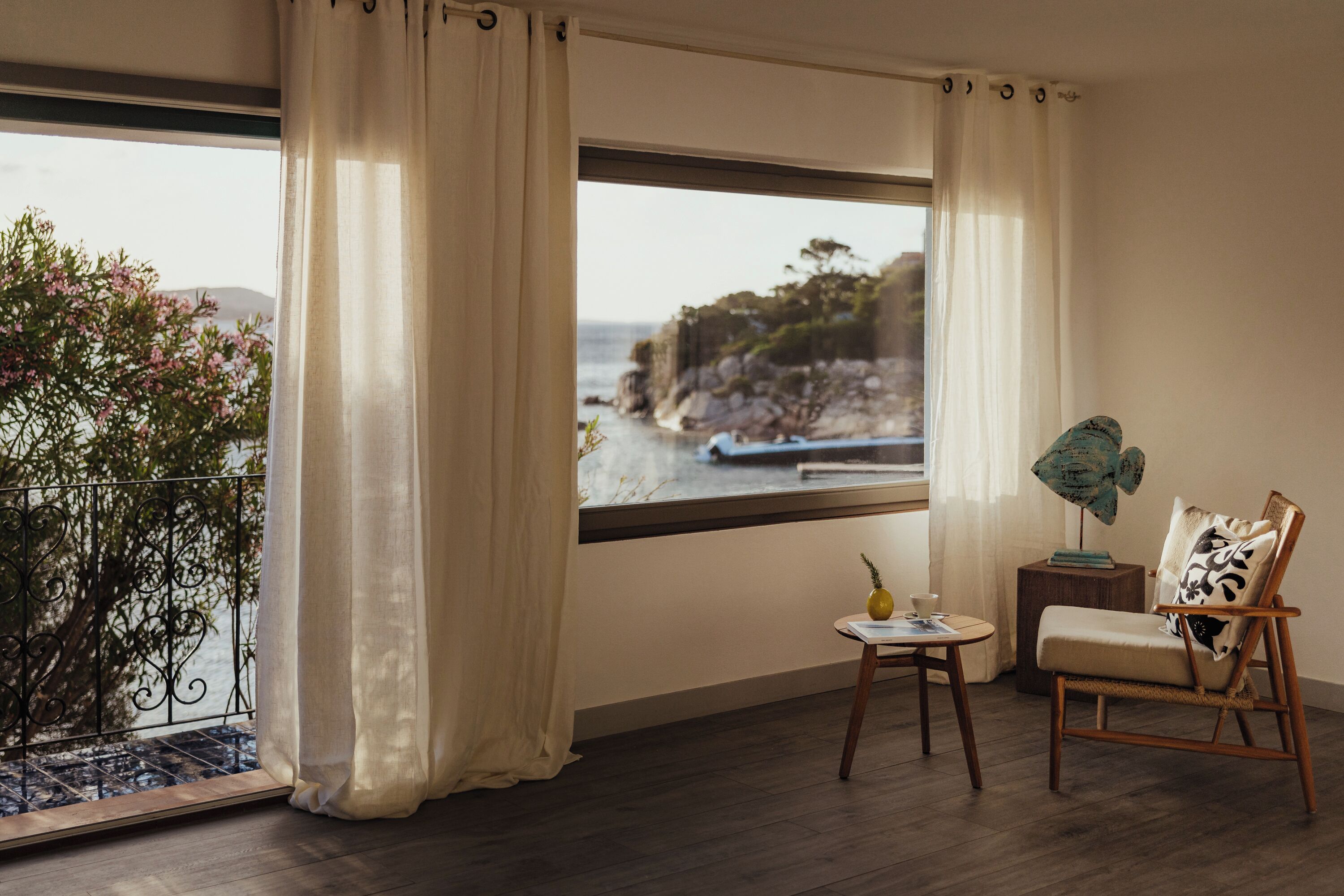 Suite, Sea View | Minibar, in-room safe, individually decorated, free WiFi