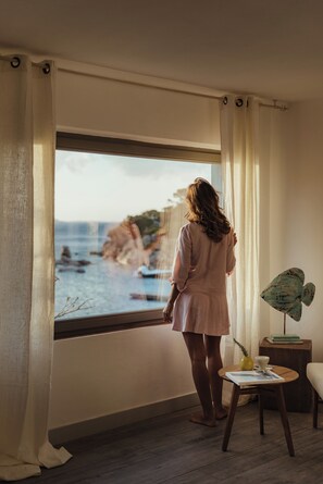 Suite, Balcony, Sea View | Minibar, in-room safe, individually decorated, free WiFi