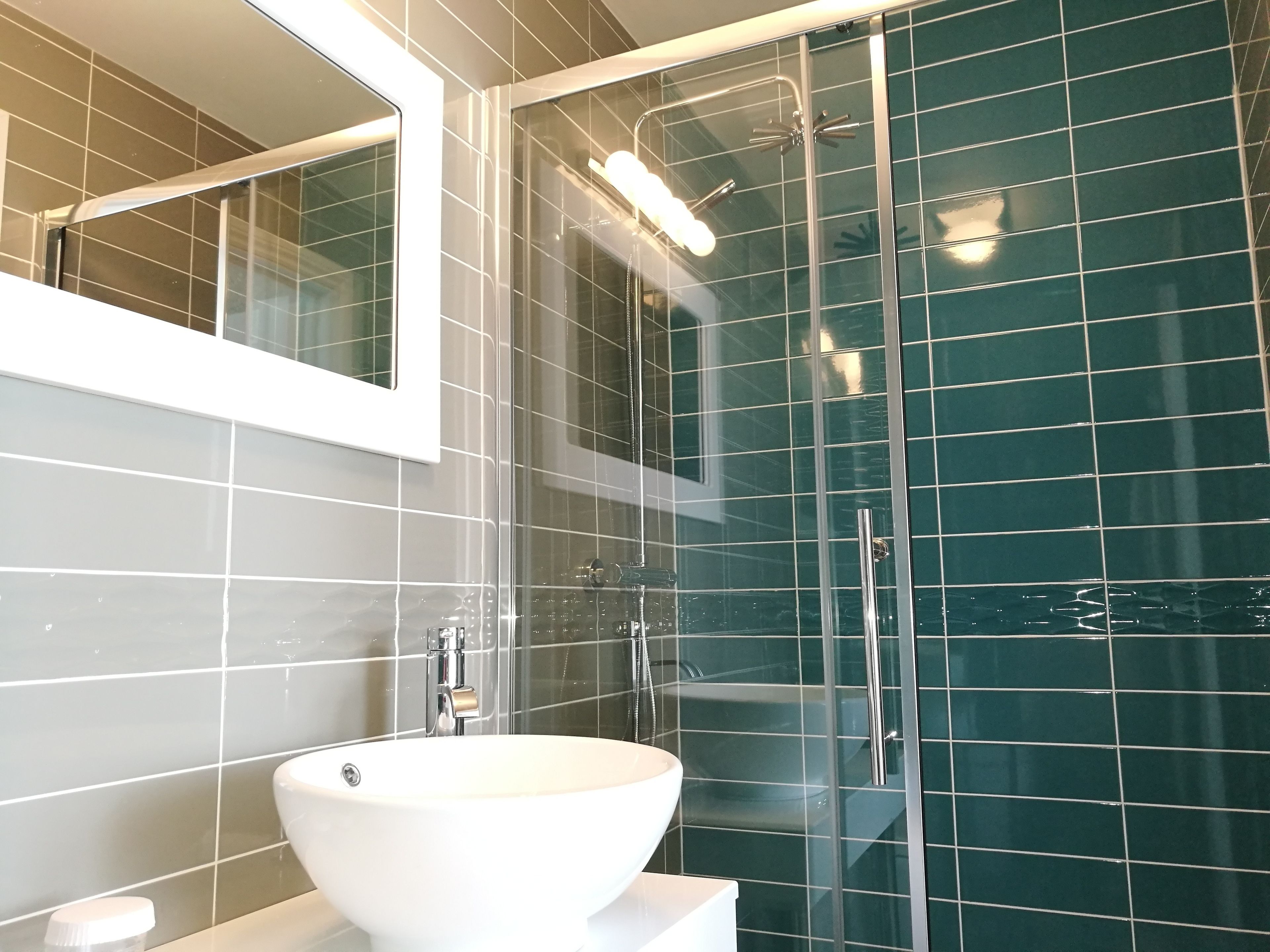 signature suite, sea view | bathroom | shower, free toiletries, bathrobes, slippers