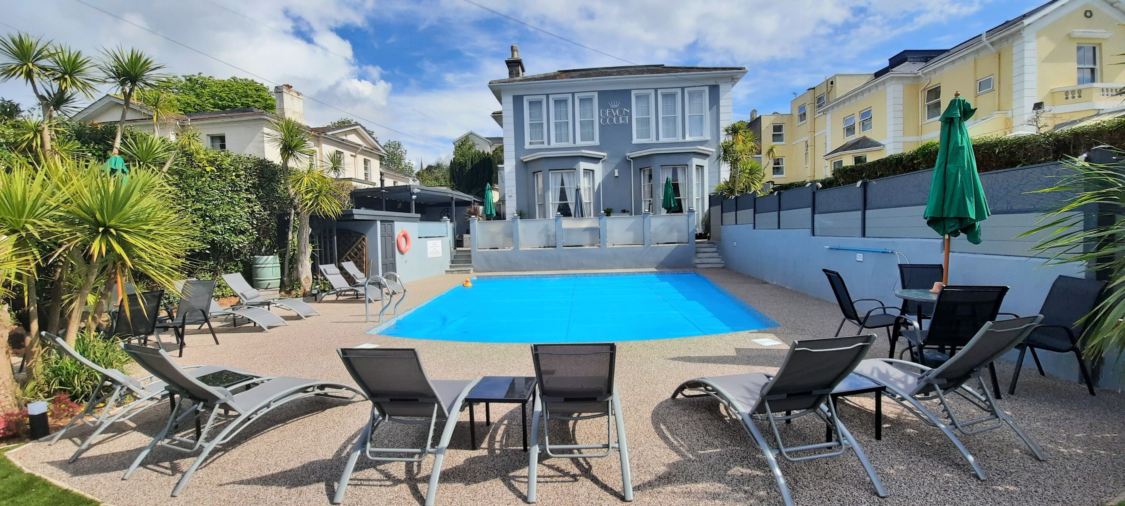 Seasonal outdoor pool, pool loungers