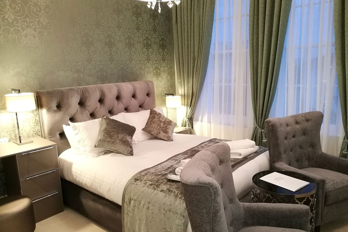 Suite Prestigio, vista al mar | Ropa de cama de alta calidad y minibar