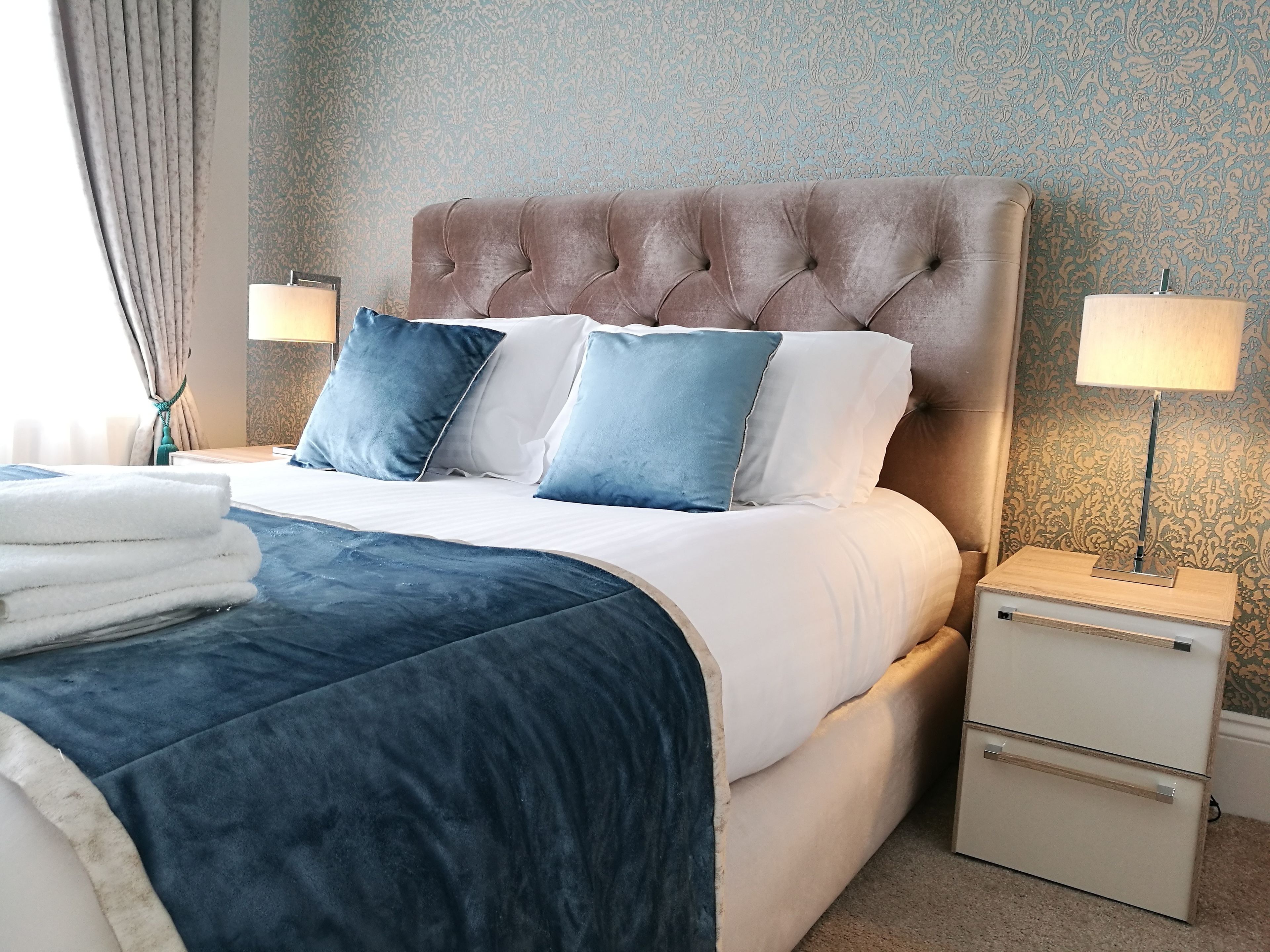 Suite Khas, pemandangan laut | Seprai premium, minibar, ruang kerja ramah laptop, dan Wi-Fi gratis