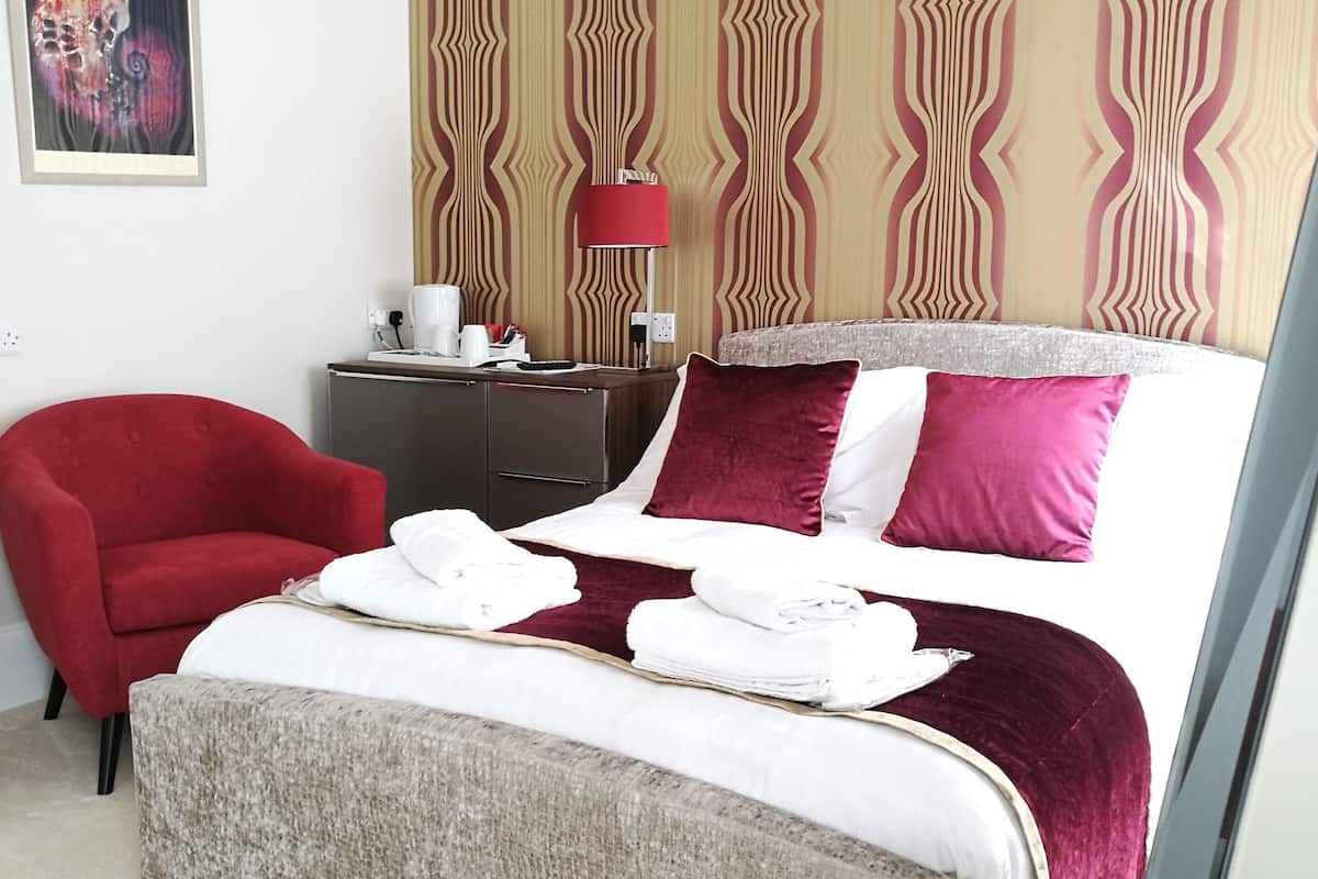 Habitación doble | Ropa de cama de alta calidad y minibar
