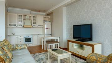 Familienapartment | Wohnbereich | Flachbildfernseher
