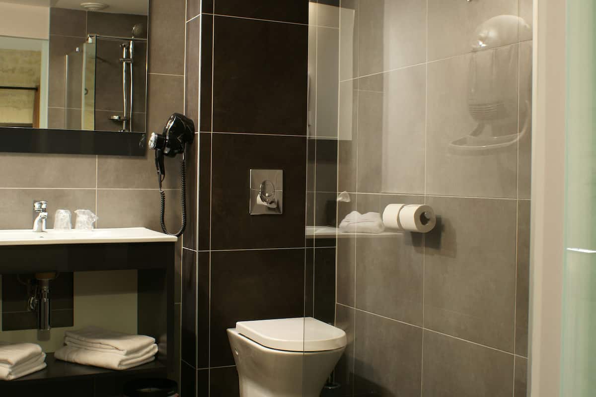 double room, pool view | bathroom | rainfall showerhead, free toiletries, hair dryer, towels