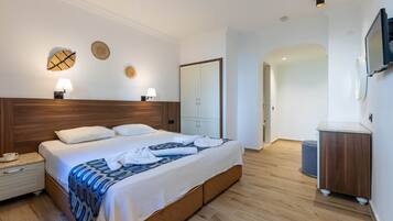 Economy Room | Minibar, free WiFi, bed sheets
