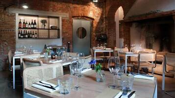 Lunch, dinner served; local cuisine, garden views