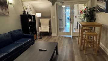 32-inch flat-screen TV with cable channels, TV