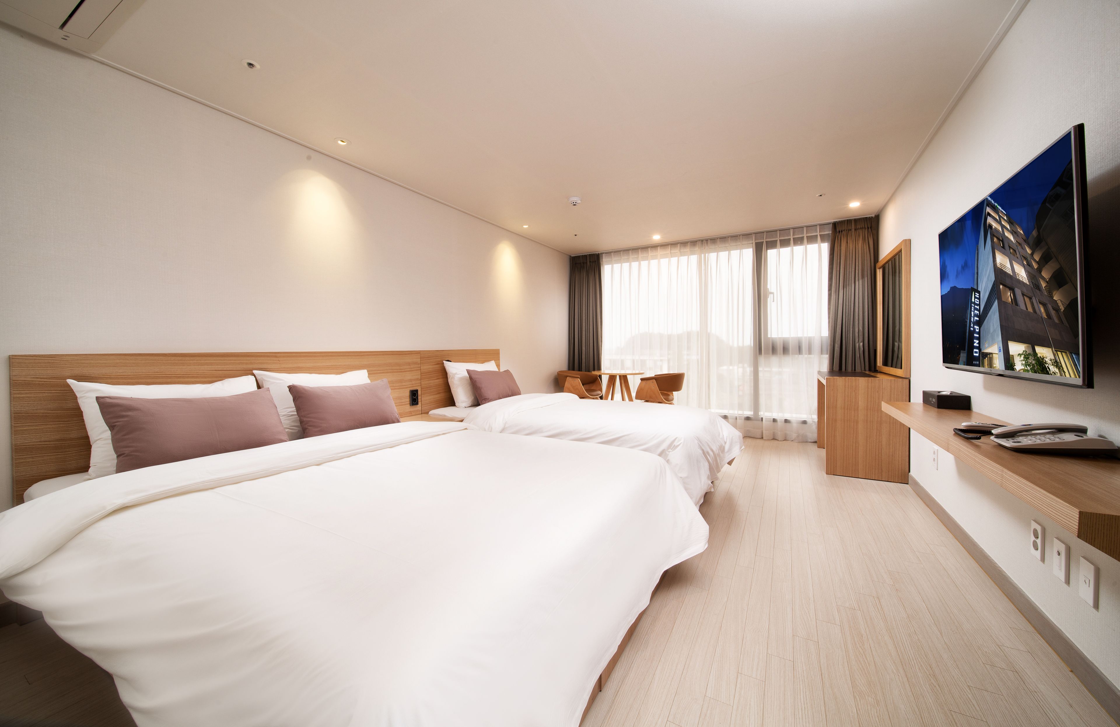 standard twin room | premium bedding, desk, soundproofing, free wifi