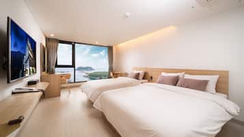 Habitación Deluxe con 2 camas individuales | Ropa de cama de alta calidad, escritorio, insonorización y wifi gratis