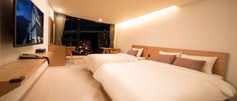 Habitación Deluxe con 2 camas individuales | Ropa de cama de alta calidad, escritorio, sistema de insonorización