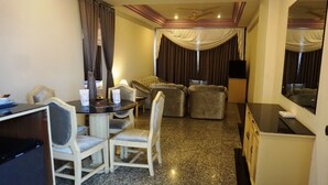 Suite | Minibar, in-room safe, desk, free rollaway beds - Hotel Poonja International (Mangaluru)