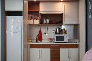 Quadruple Room, City View | Private kitchen - Hongstay in Hongdae (Seoul)