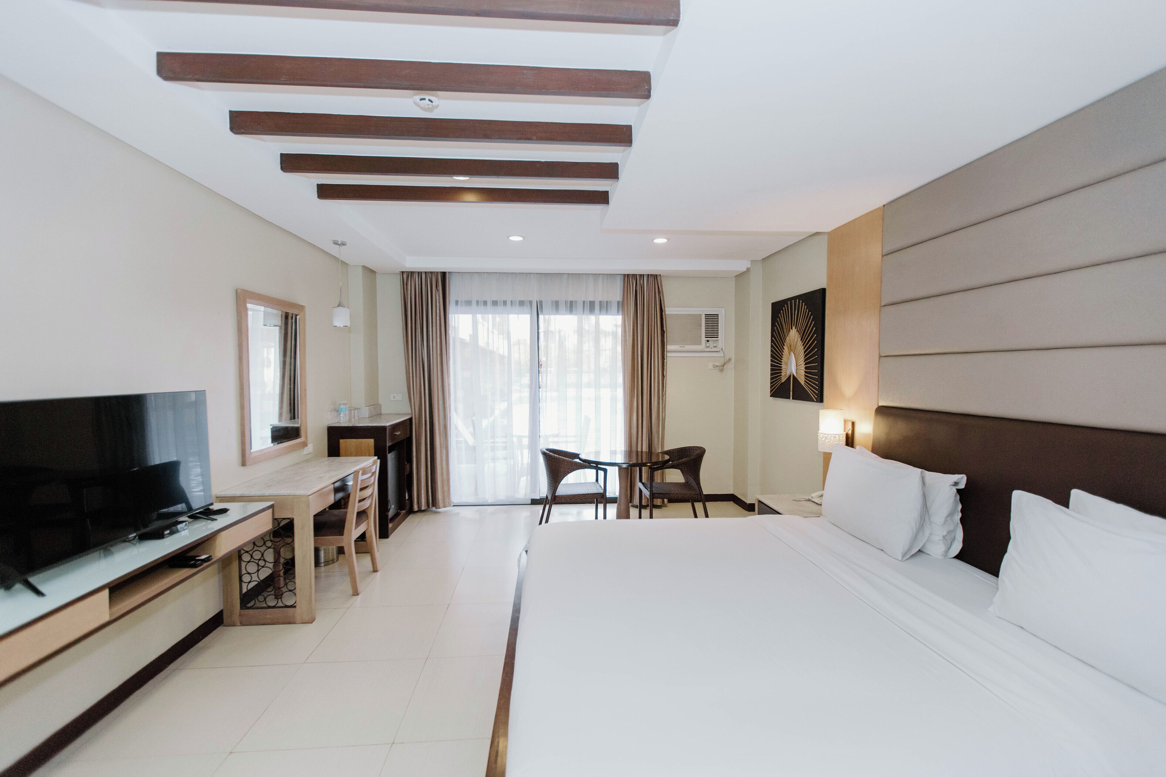 superior king with pool access | in-room safe, desk, wifi, bed sheets