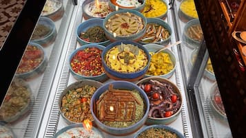 Breakfast, lunch, dinner served; international cuisine