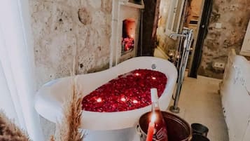 Shower, designer toiletries, hair dryer, bathrobes