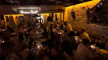 Breakfast, lunch, dinner served; international cuisine