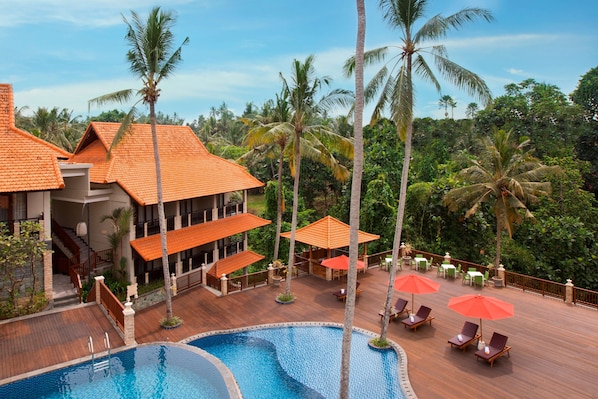 2 outdoor pools, open 7:00 AM to 7:00 PM, pool umbrellas, pool loungers