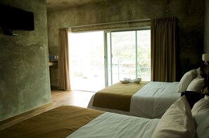 Junior-huone, 2 keskisuurta parisänkyä | Silitysrauta/-lauta, ilmainen Wi-Fi