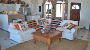 House, 4 Bedrooms | Living area | Flat-screen TV