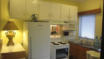 2 Bedroom Apartment | Private kitchen | Full-size fridge, microwave, oven, stovetop