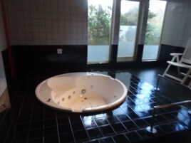 Shower, free toiletries, hair dryer, slippers