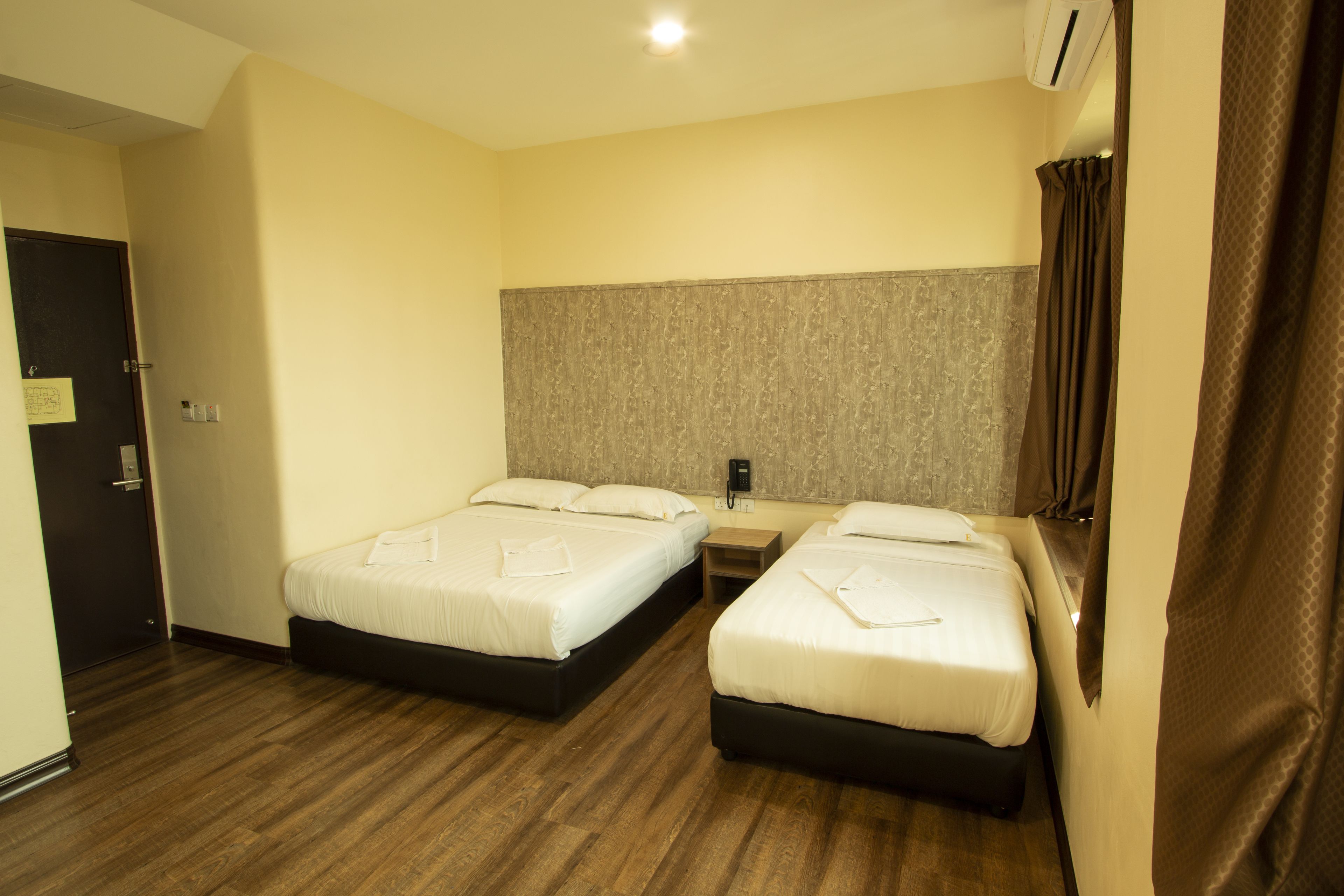 Premium bedding, desk, iron/ironing board, rollaway beds