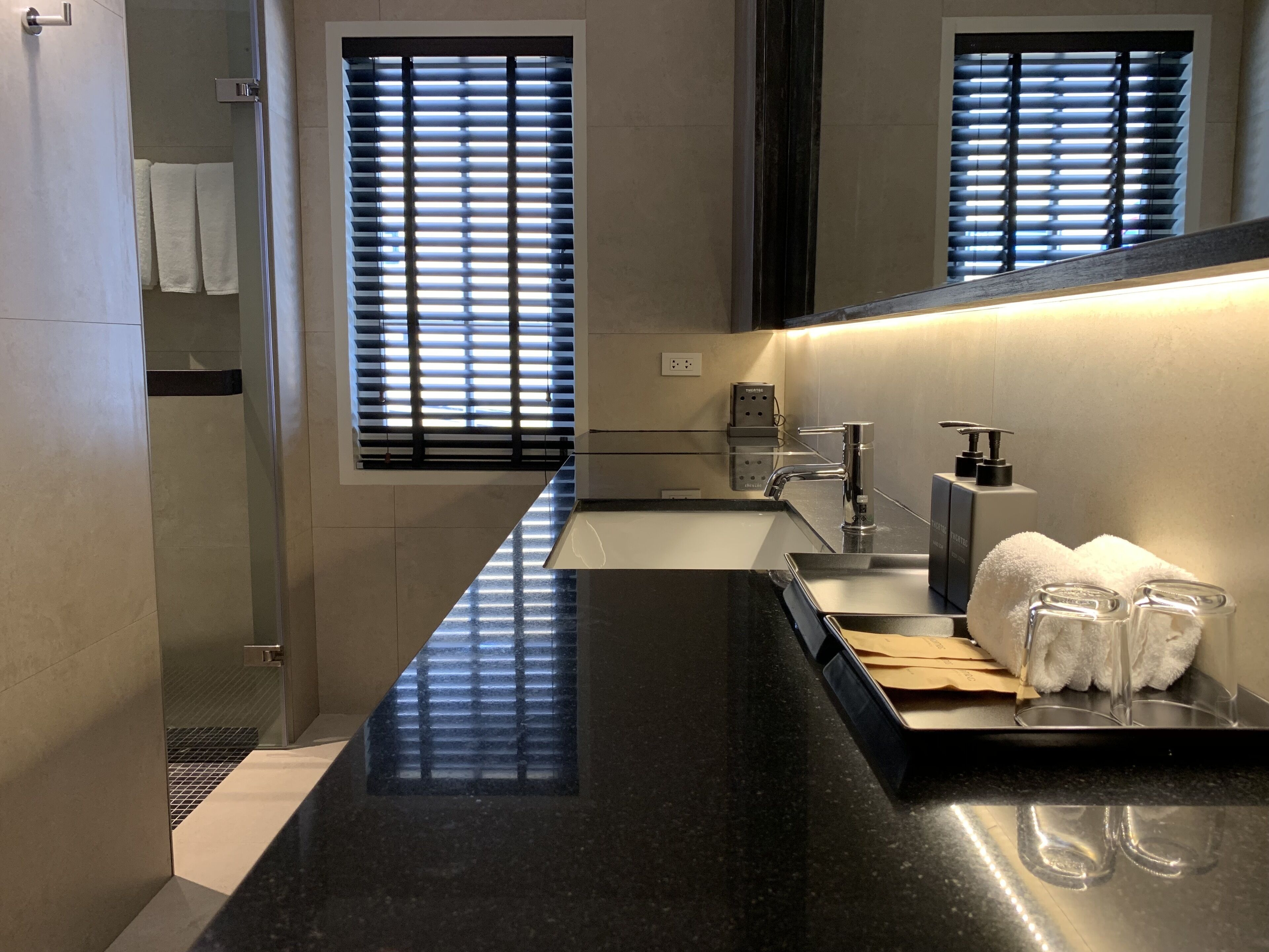 lilit grand suite | bathroom | shower, rainfall showerhead, free toiletries, hair dryer